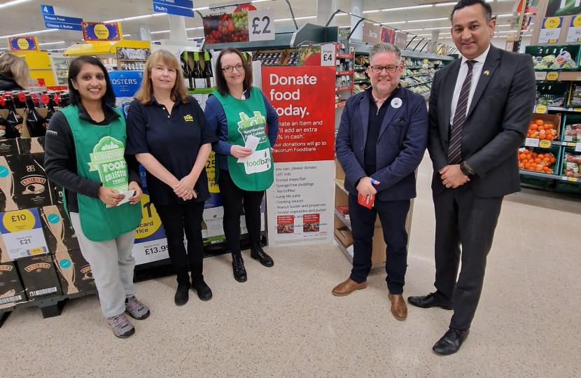 Gagan with Tesco Superstore employees